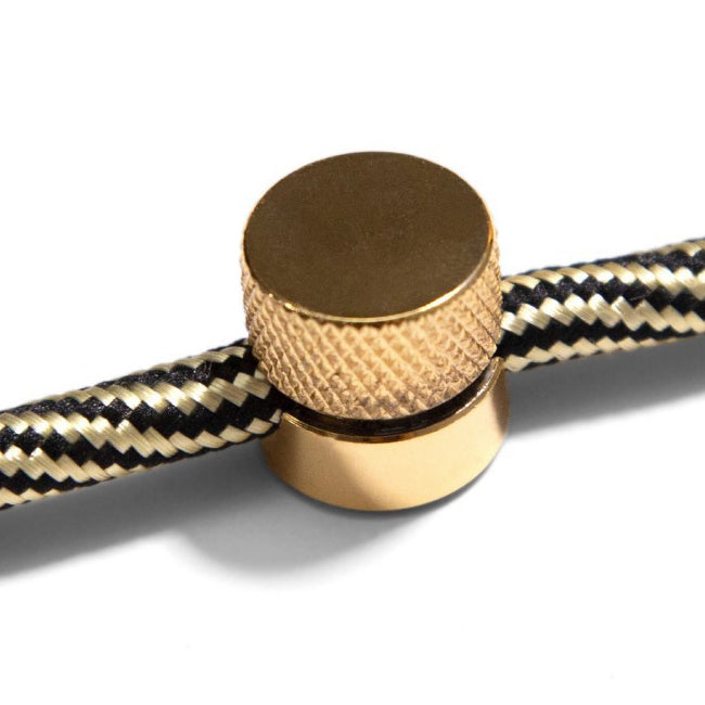 Soporte dorado para cable eléctrico - CASO0011